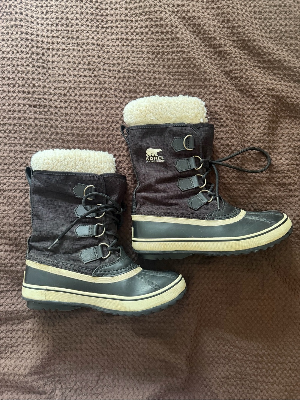 SOREL women’s Waterproof Winter Boots with Sherpa Lining